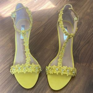 Yellow high heels